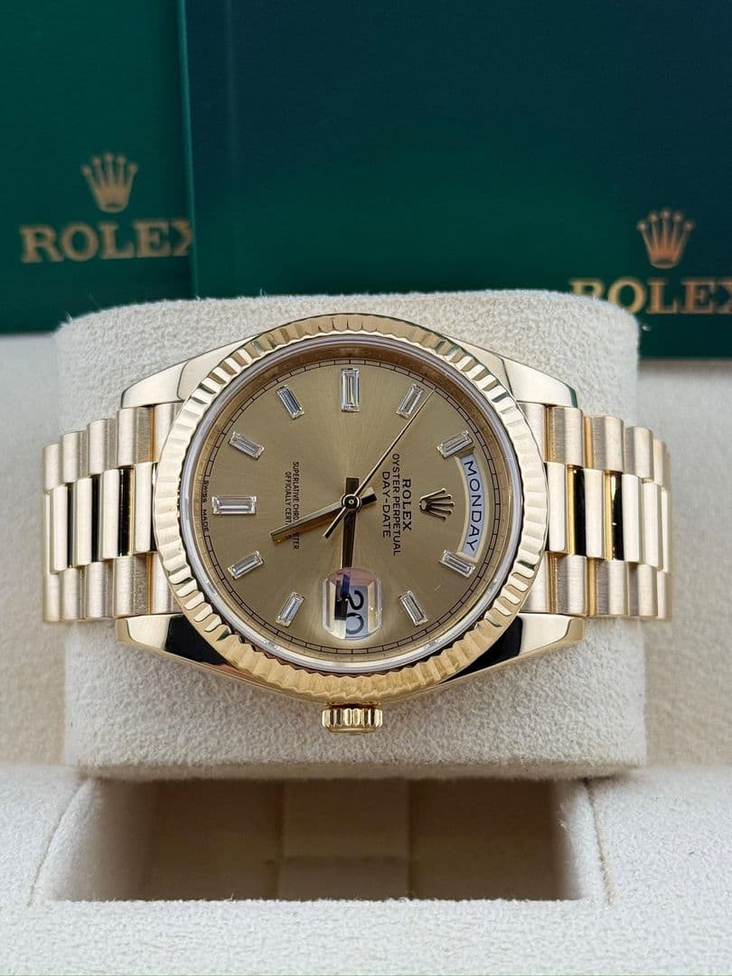 Rolex Daydate 40mm champagne baguette dial 228238