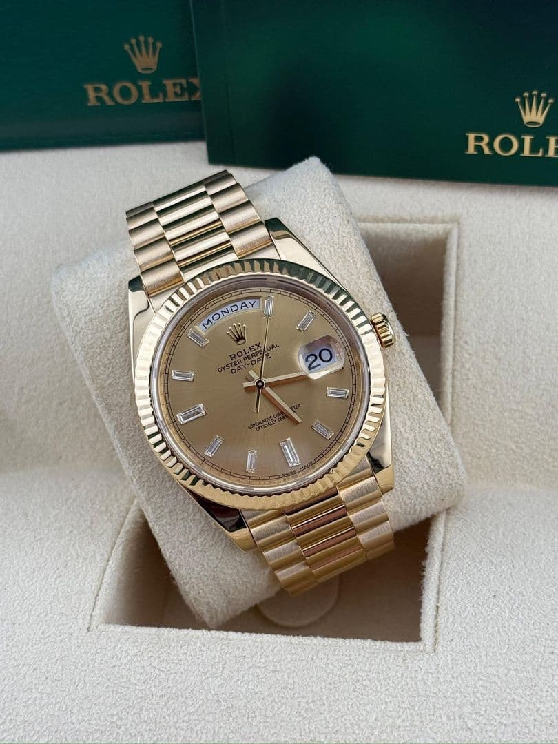 Rolex Daydate 40mm champagne baguette dial 228238